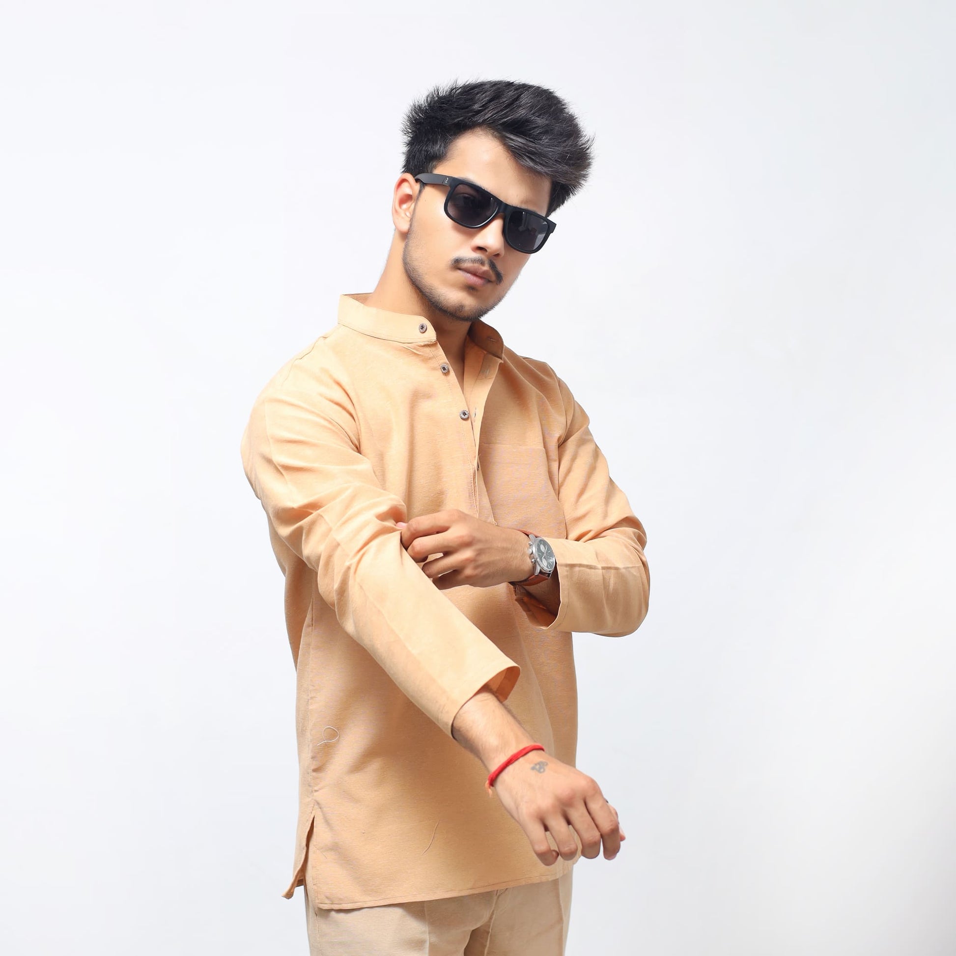 Beige Solid Full Sleeves Khadi Cotton Short Kurta front pose with sunglasses