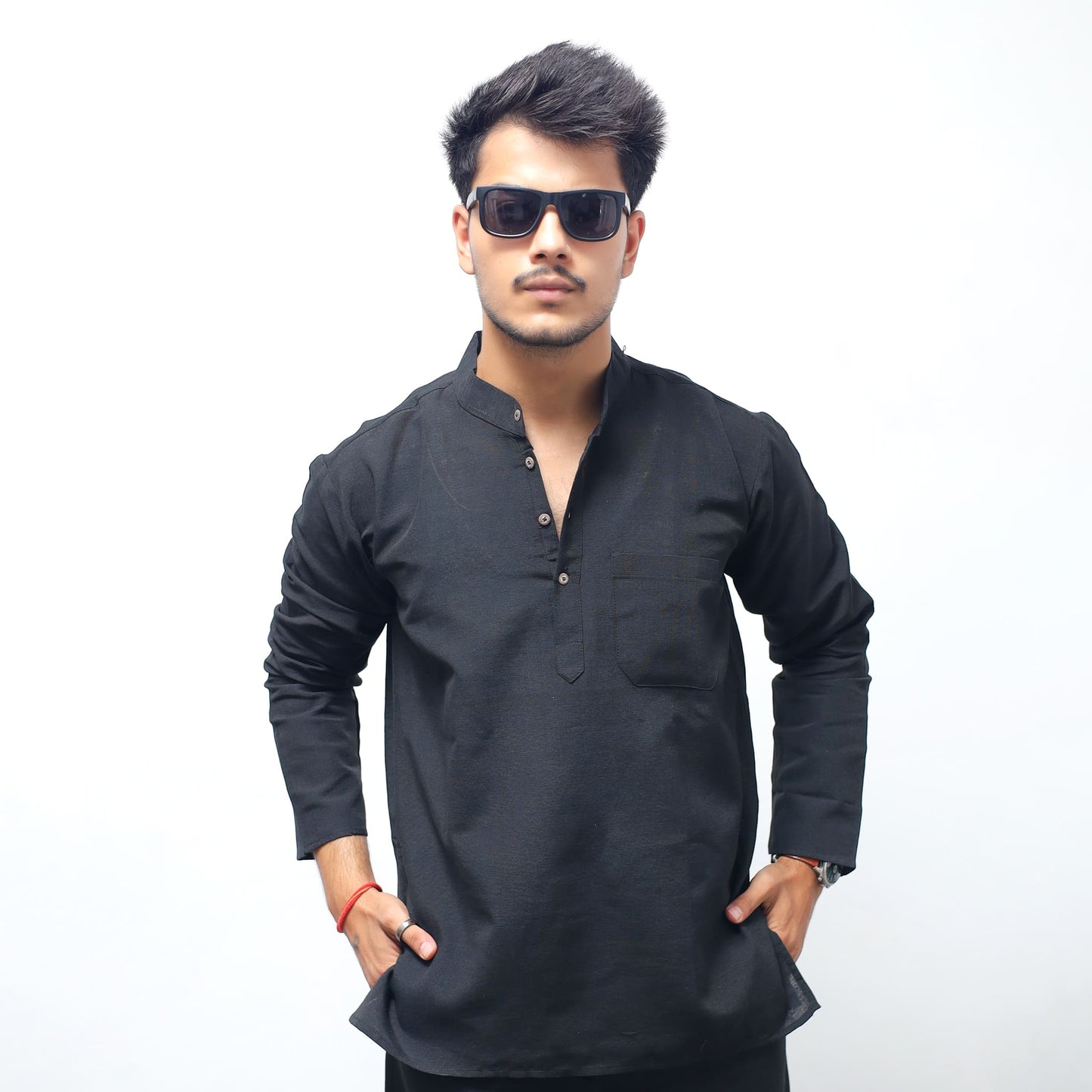 Black solid full sleeves khadi cotton short kurta front pose hands in pockets with sunglasses