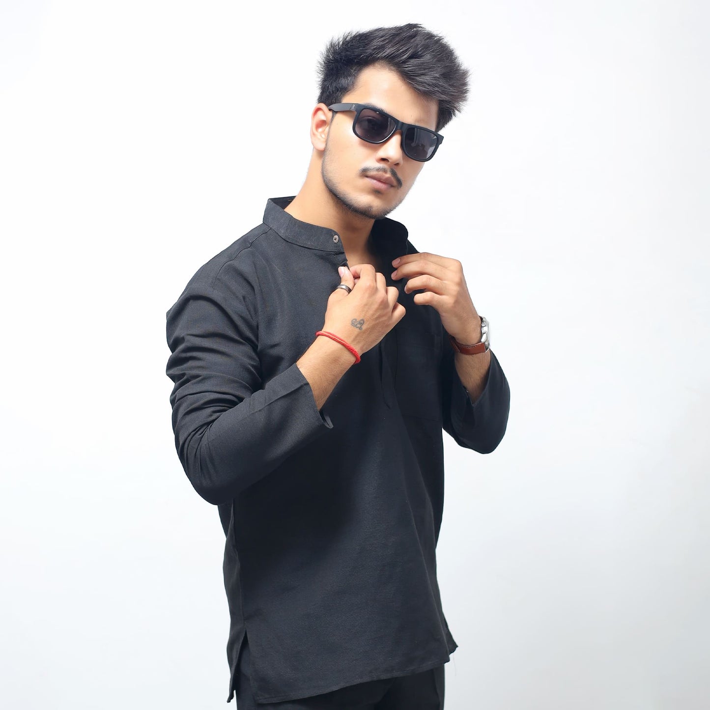 Black solid full sleeves khadi short kurta side pose adjusting collar stylish look