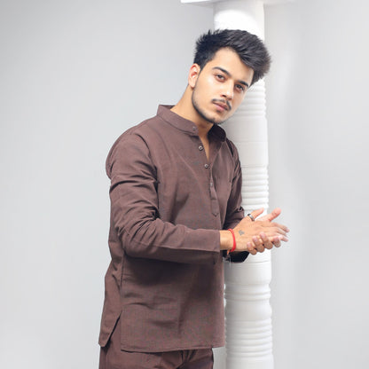 Brown Solid Full Sleeves Khadi Cotton Short Kurta side view near pillar styling pose