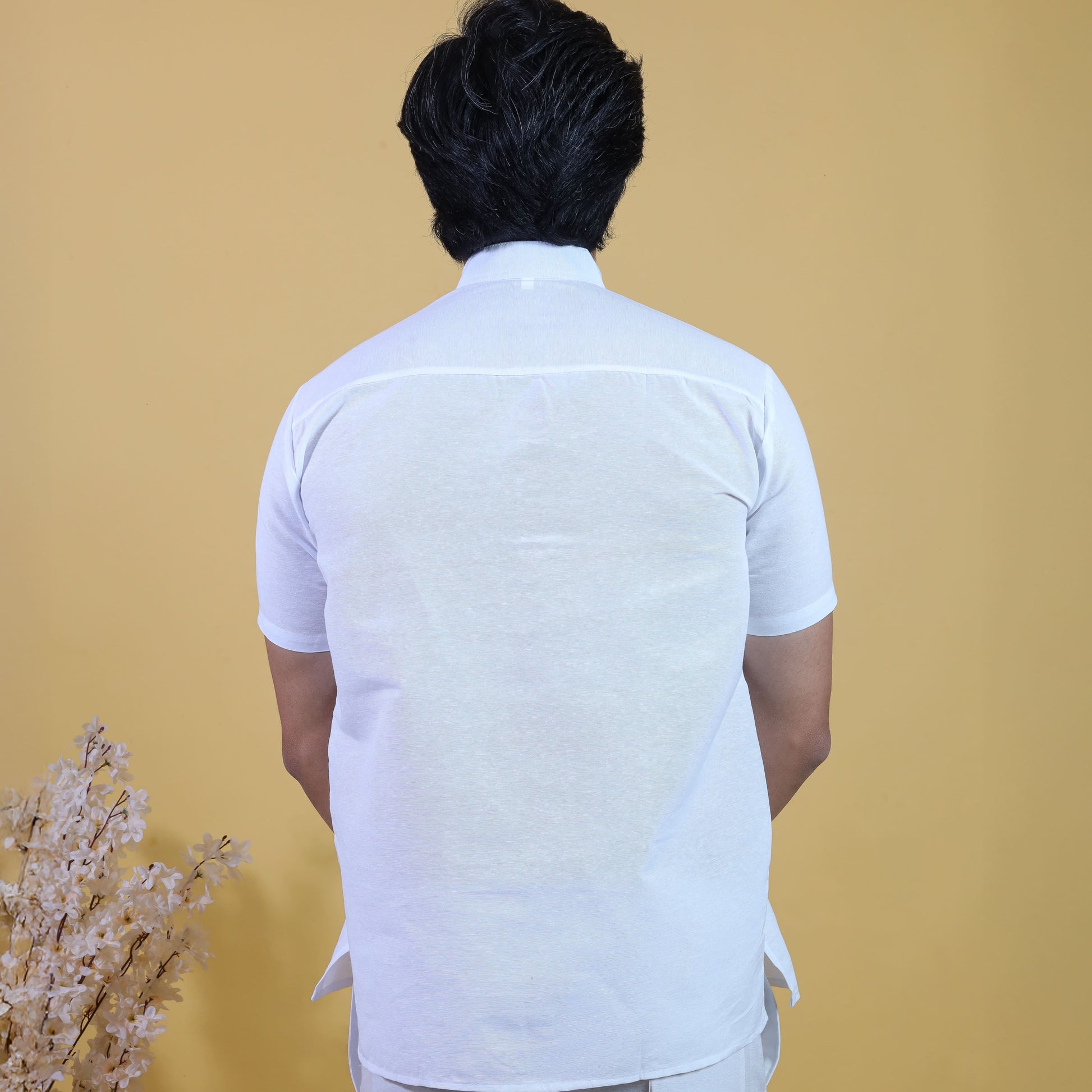 Back view white solid khadi short kurta for men