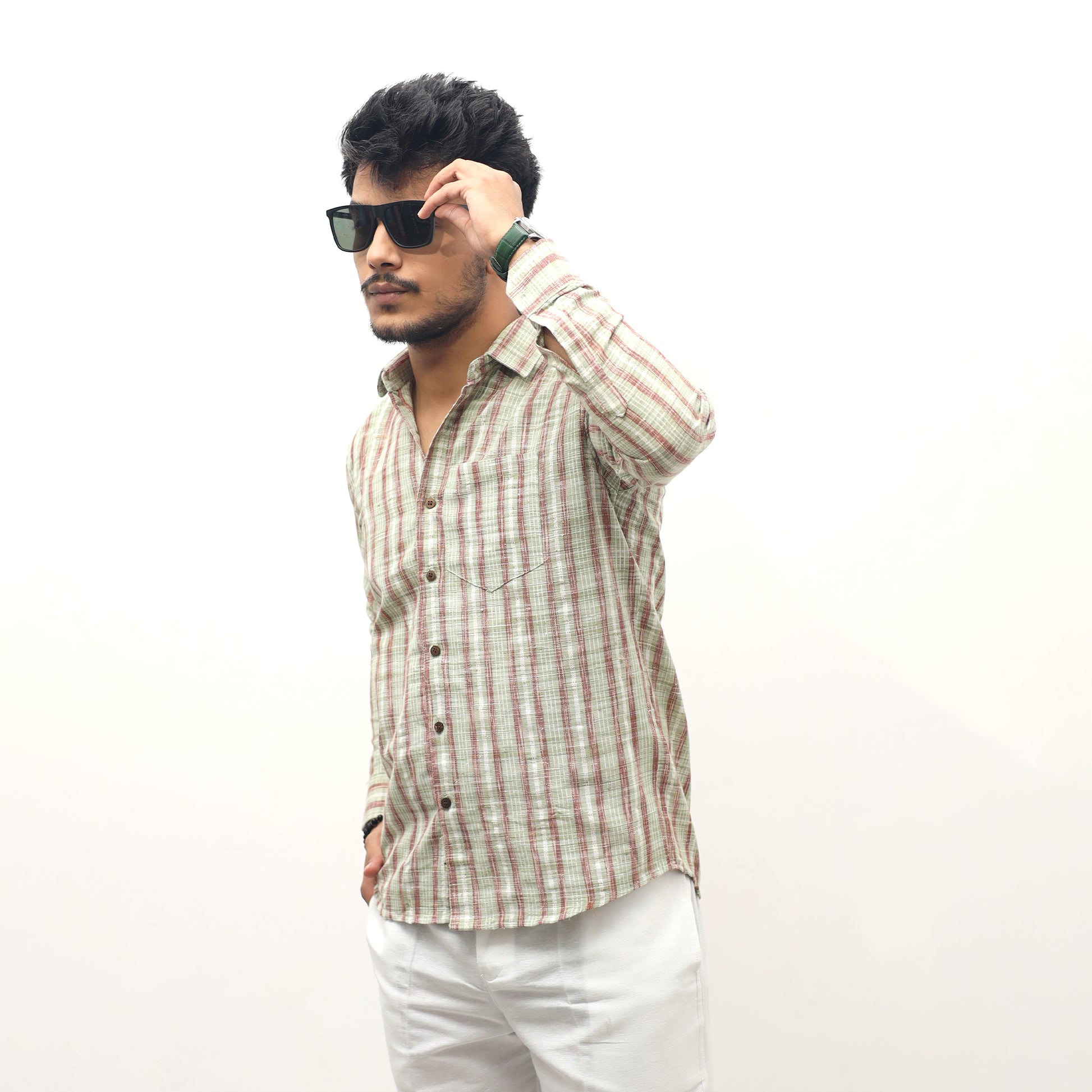 Side view green khadi cotton striped shirt men wearing sunglasses