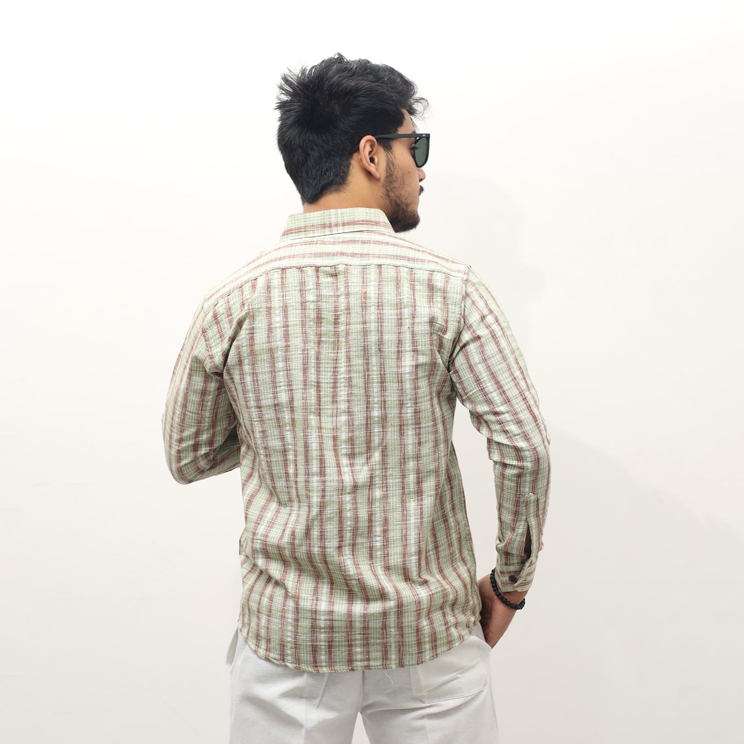 Back view green khadi cotton full sleeves striped shirt for men