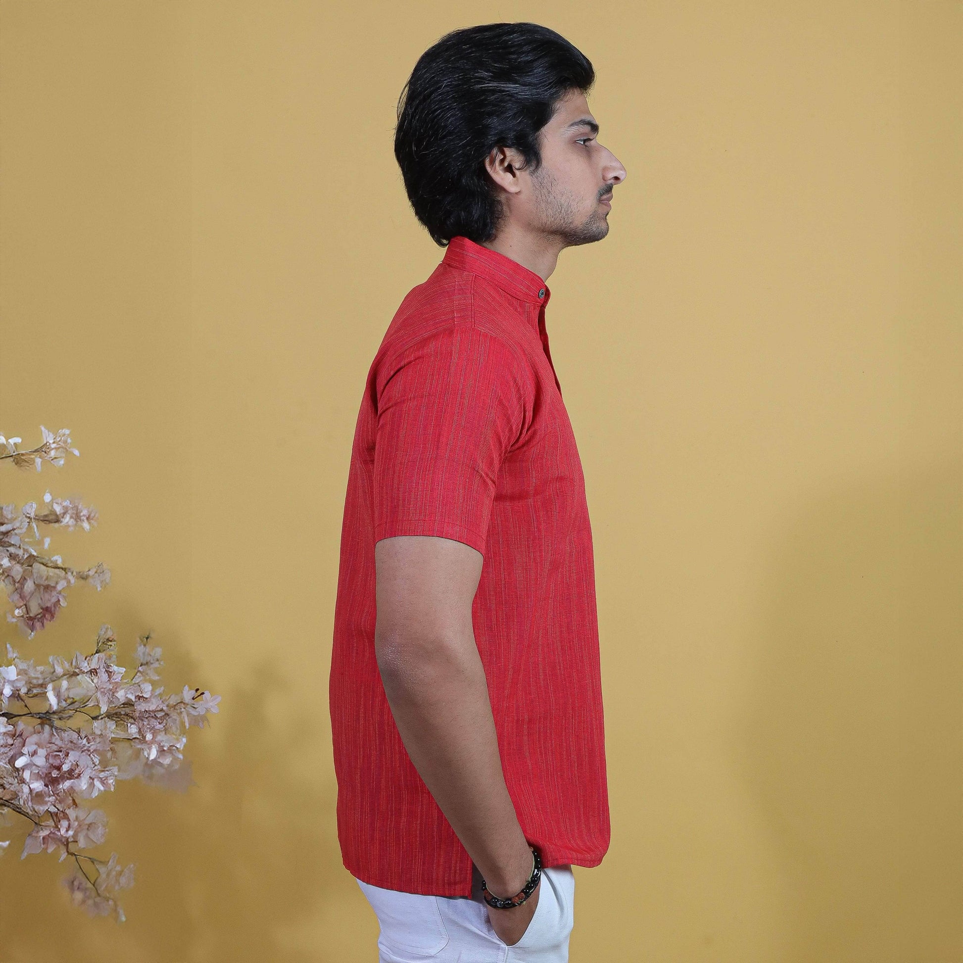 Side profile of Red Thread Lines Half Sleeves Khadi Short Kurta highlighting structured fit