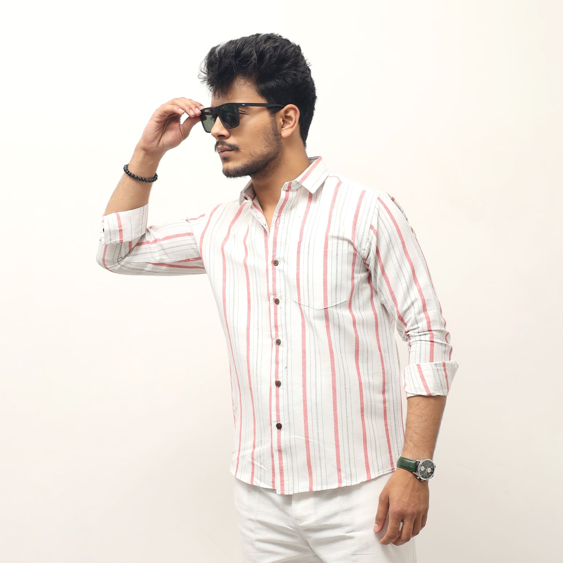 Stylish khadi striped shirt men side pose sunglasses