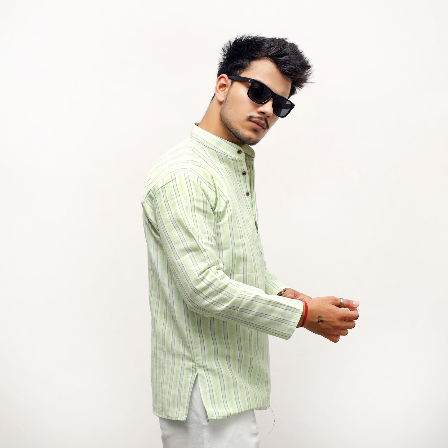 Side view of green-white striped full sleeves khadi short kurta for men
