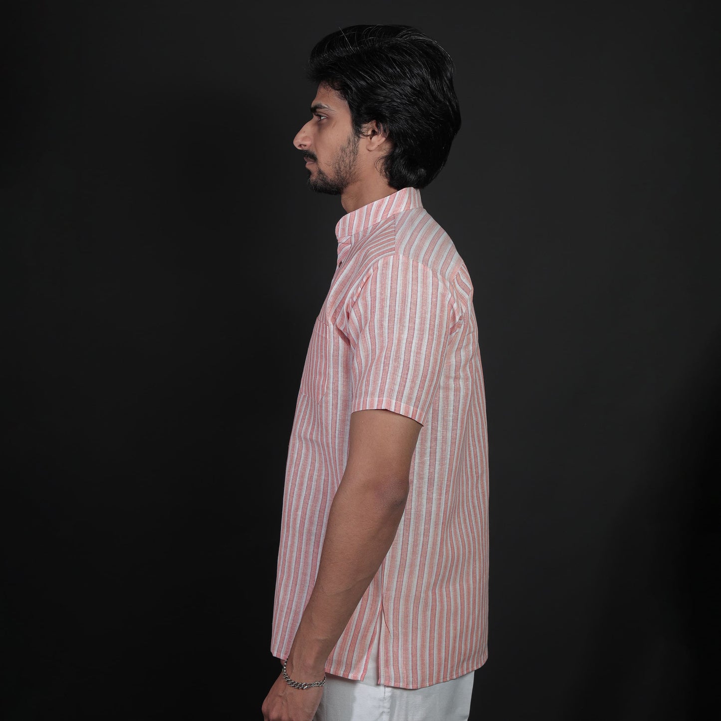Side view of orange white striped half sleeves kurta for men