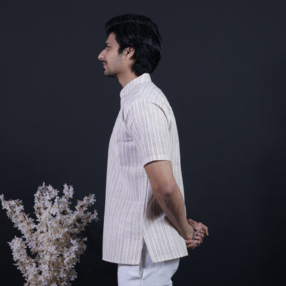 Side profile of beige white striped half sleeves kurta for men