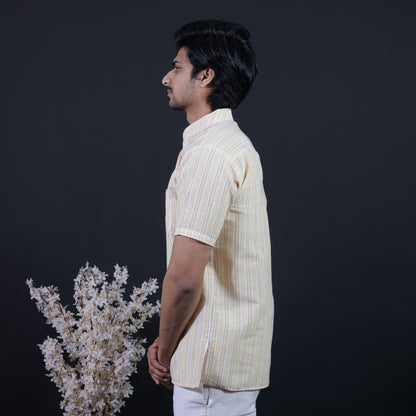 Side profile of yellow white striped half sleeves kurta for men