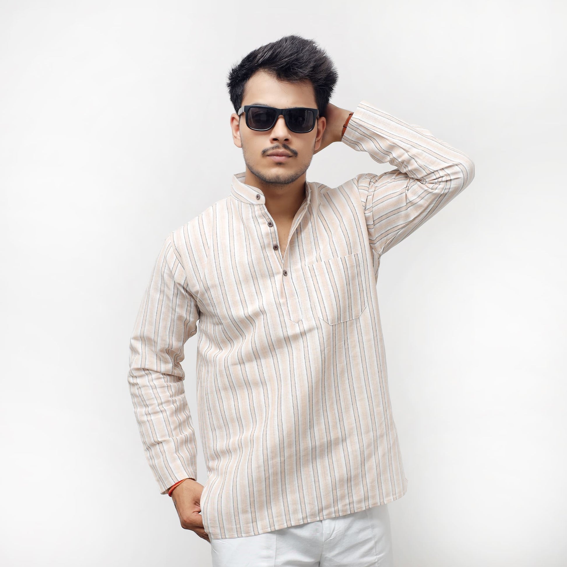 Skin white striped khadi cotton kurta styled front pose