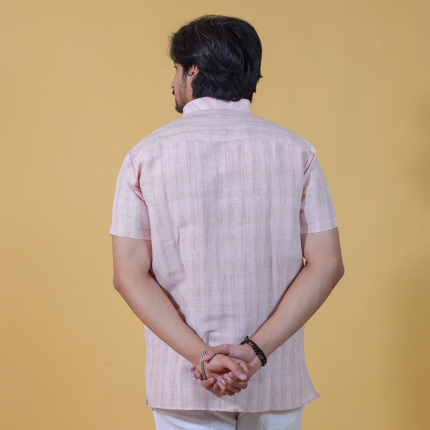 Back view of light pink wide striped kurta for men