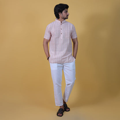 Light pink wide striped half sleeves kurta pant combo set front view for men