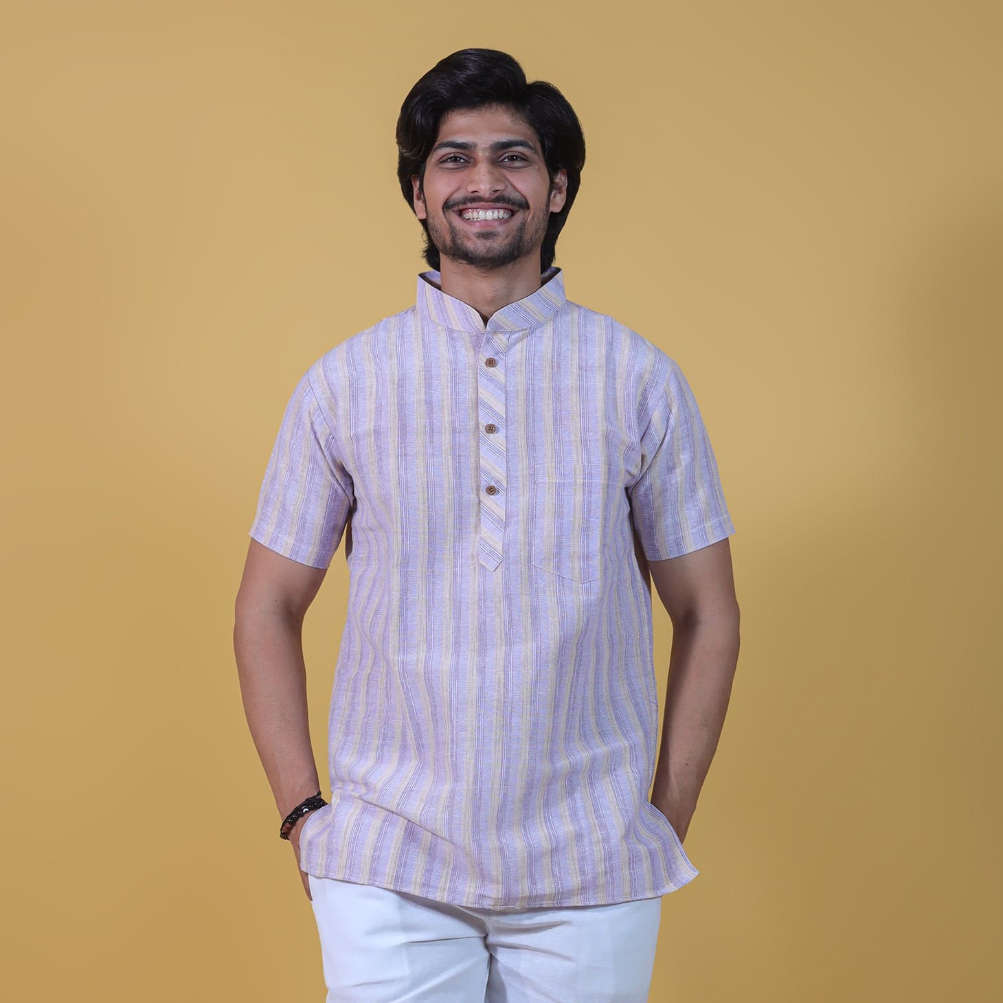 Front look of men wearing half sleeves purple wide striped khadi cotton kurta