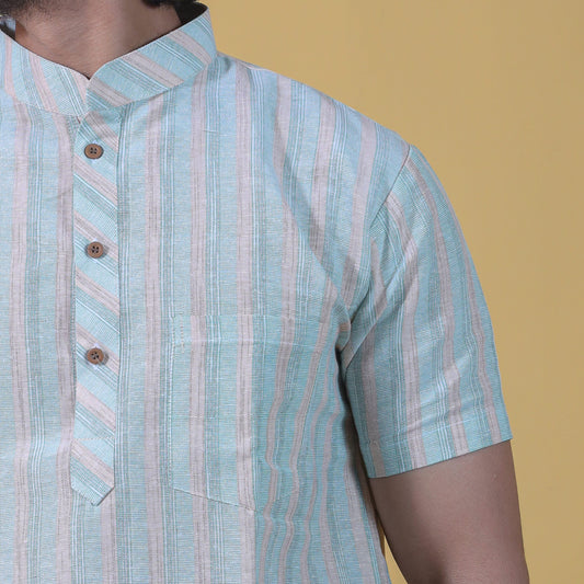 Close-up green stripe kurta fabric and button placket detail