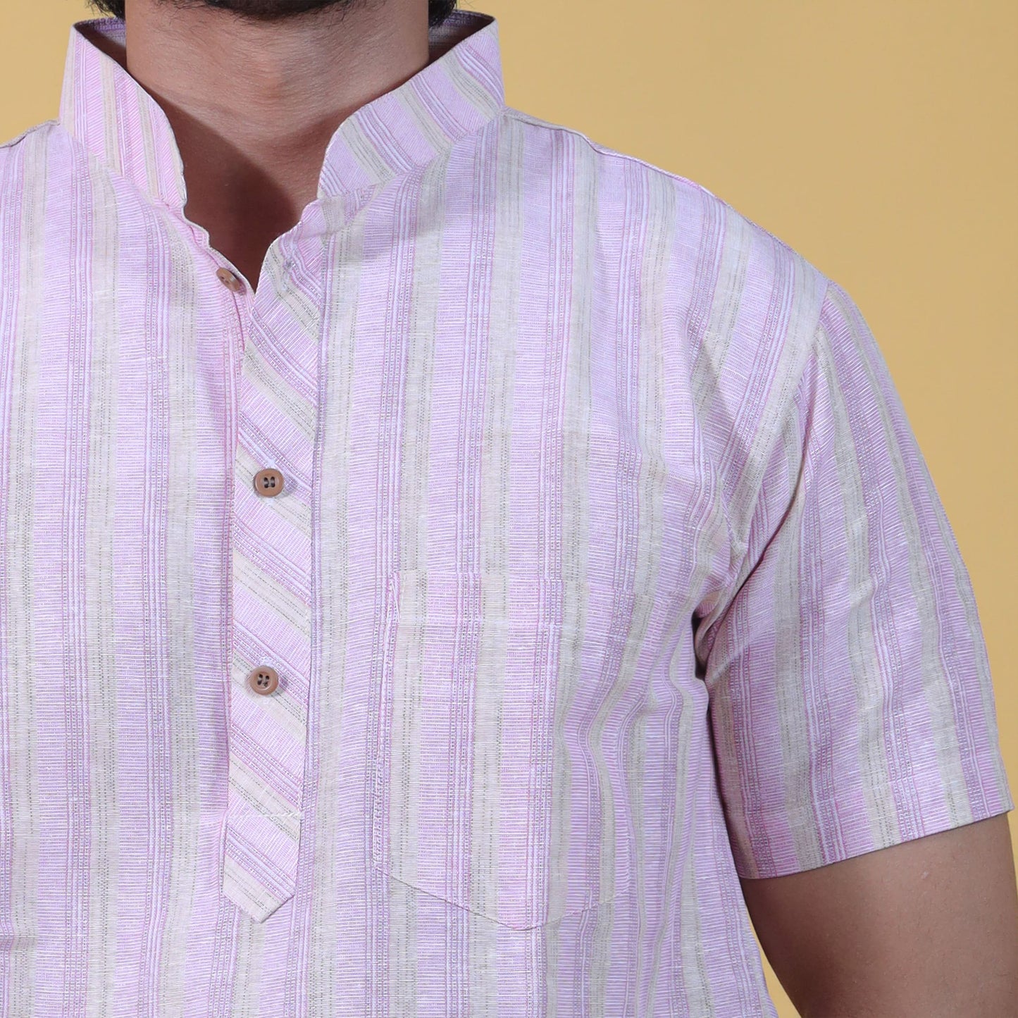 Pink stripe kurta close-up showing texture and button placket